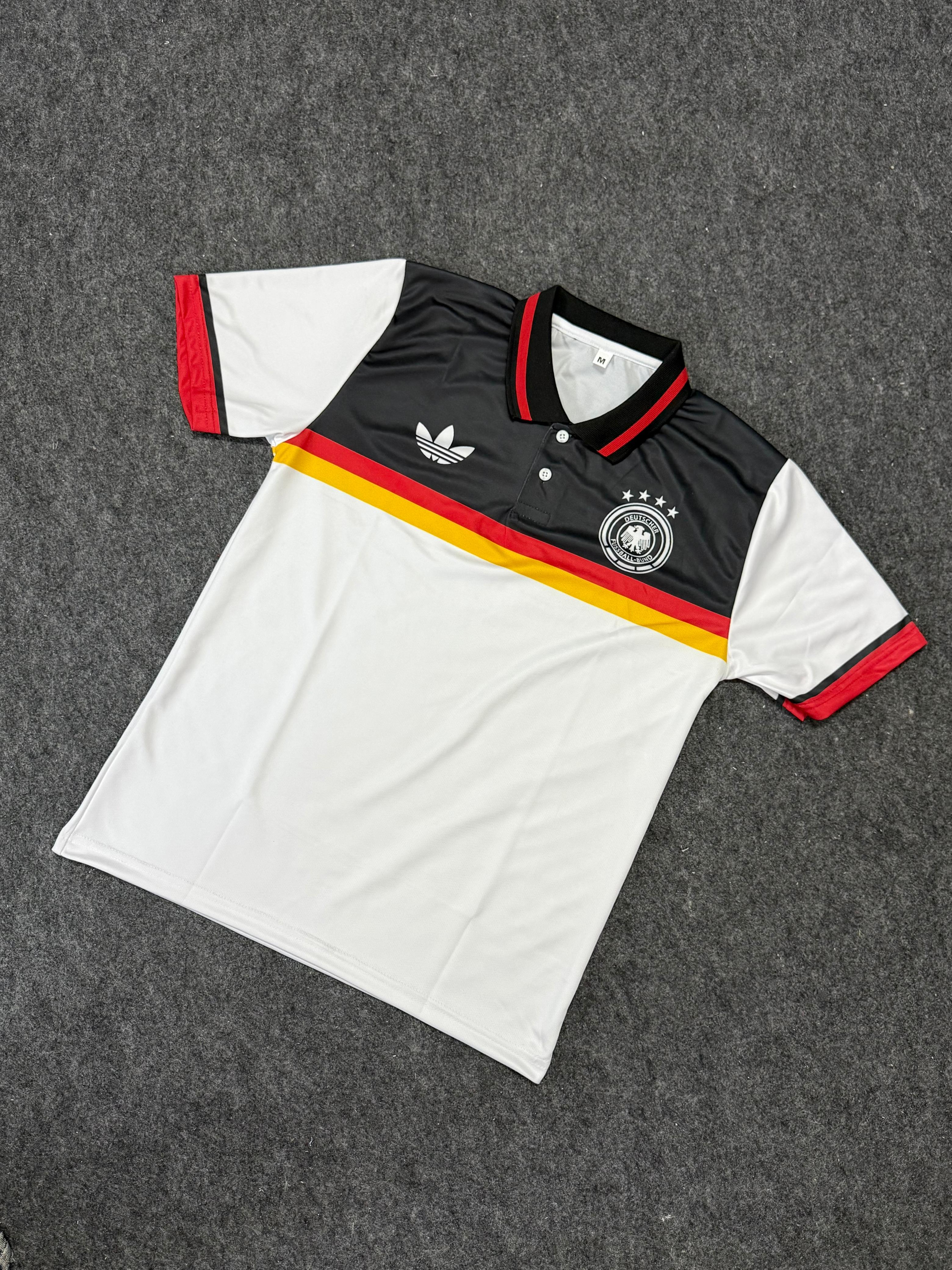 Adidas Originals Germany retro football jersey featuring the iconic 1988 home kit design.